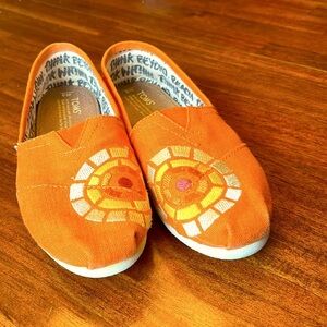 Toms limited edition CTAOP Charlize Theron African Outreach Project slip-ons
